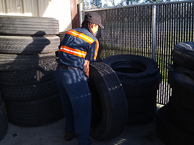 loves employee moving tires